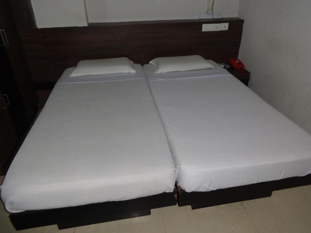 Hotel Miland Palace Bhubaneswar Quarto foto